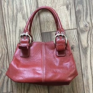 Red pebble leather handbag